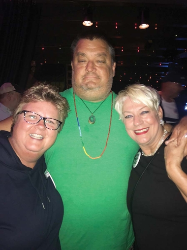 Floyd Martin (c) with Katrina Kalb (l) and Sara Cunningham of Free Mom Hugs. Photo by Robin Dorner. Floyd Martin (c) with Katrina Kalb (l) and Sara Cunningham of Free Mom Hugs. Photo by Robin Dorner.