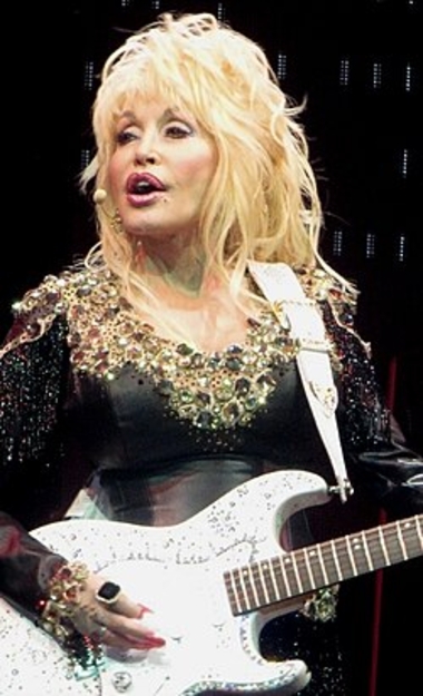 Parton performing at the Lanxess Arena in Cologne, 2014. Wikipedia Photo.